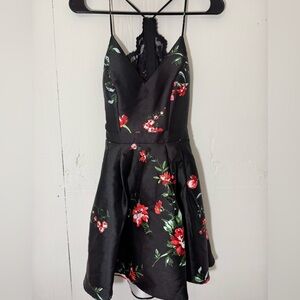 A cute twist on a little black dress, with a lacey upper back.
